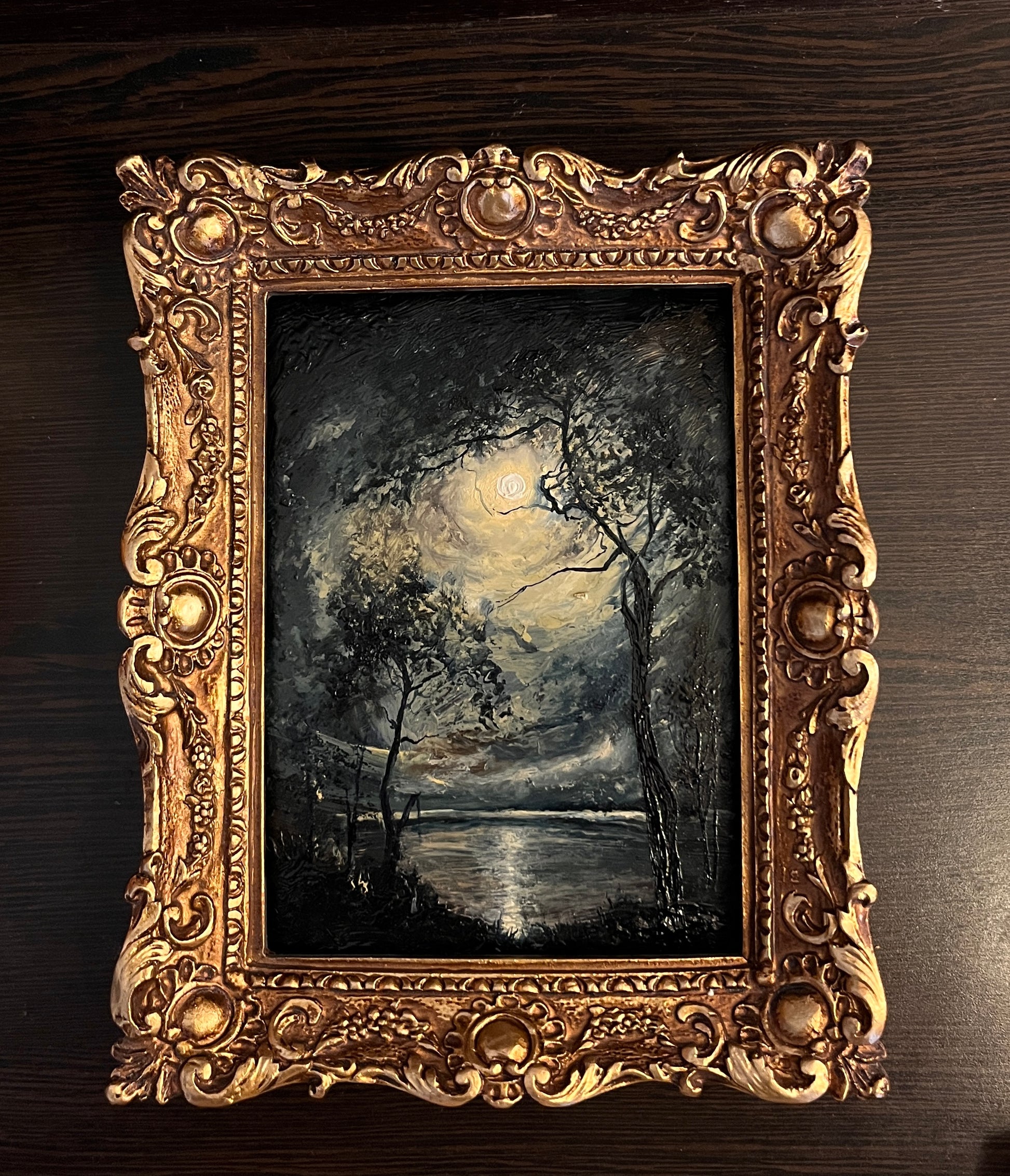 Framed painting of a moonlit landscape with trees and lake 5x7 inch