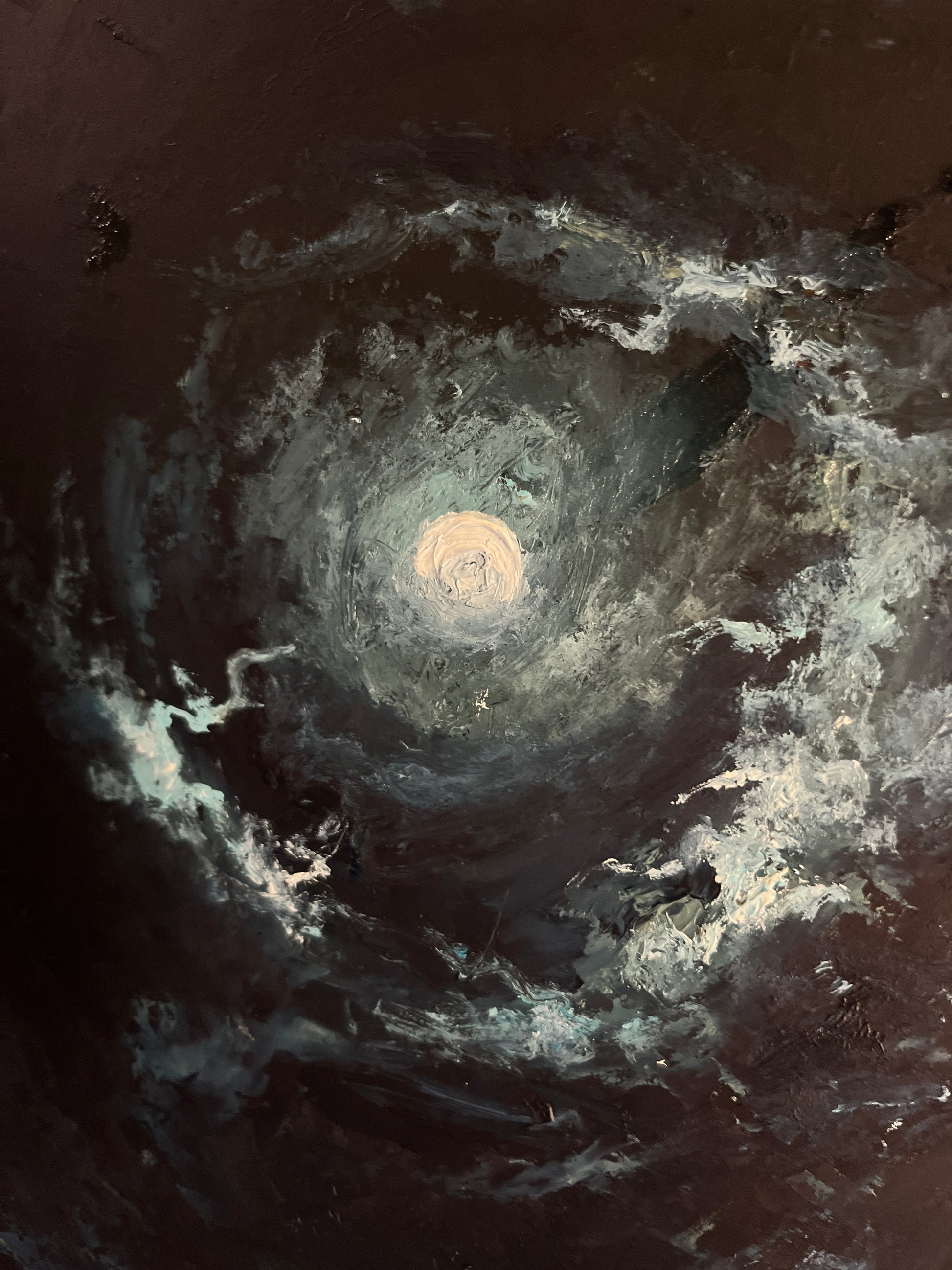 An abstract painting depicting a swirling vortex or cosmic spiral, featuring a bright pale center surrounded by dark brown, black, gray, and white textured brushstrokes.
